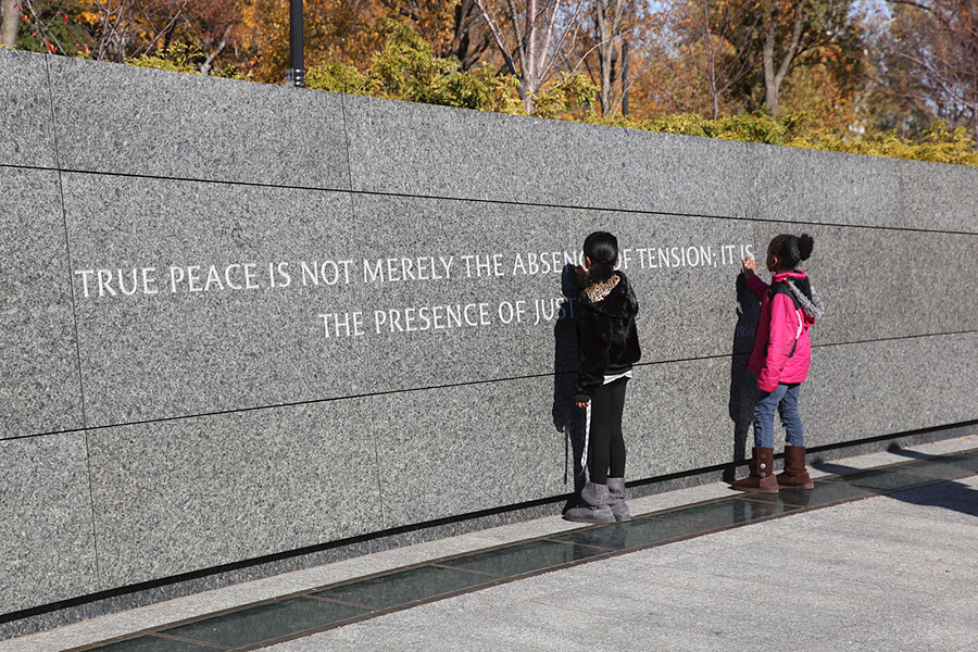 These kids were tracing the letters of this quote.