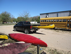 this looked like a fail until the guy from T&G Canoes fixed up his trailer hitch canoe helper that let us safely transport both canoes with the truck