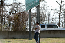 some guy posing in front of the sign we've all posed in front of