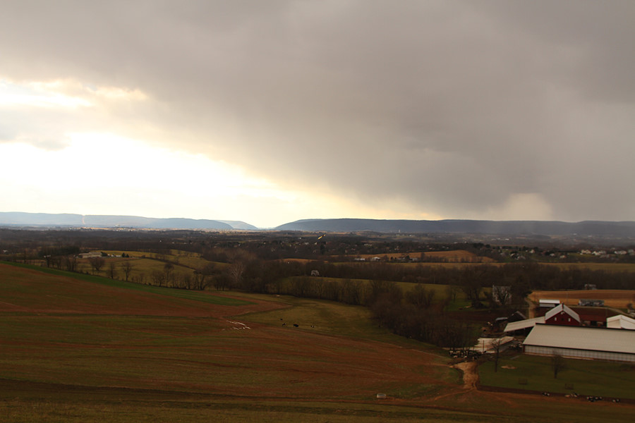 snow flurries coming across the valley