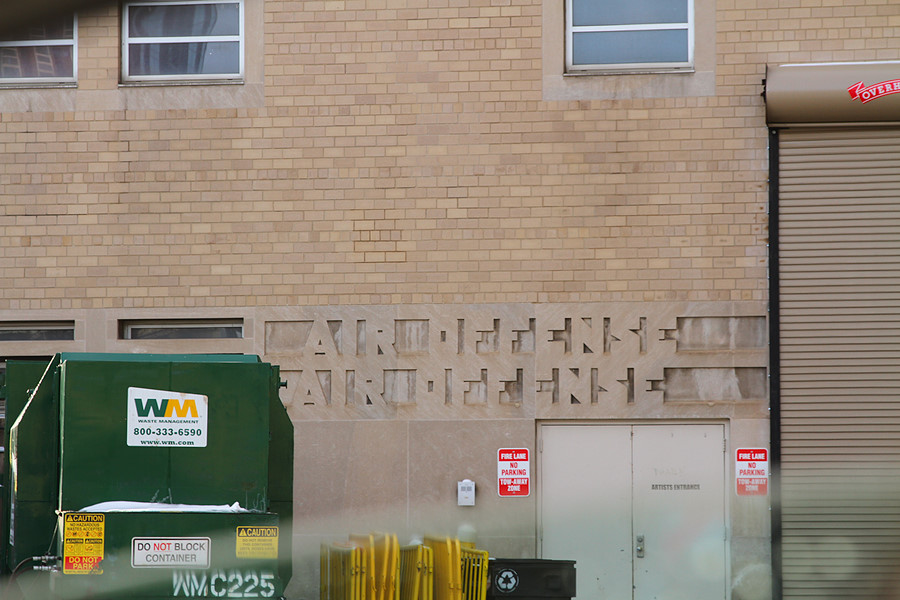 AIR DEFENSE and AIR OFFENSE on the side of a random building in Syracuse, NY