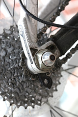 close-up of the 22mm suspension pivot bolt that holds the derailleur hangar in