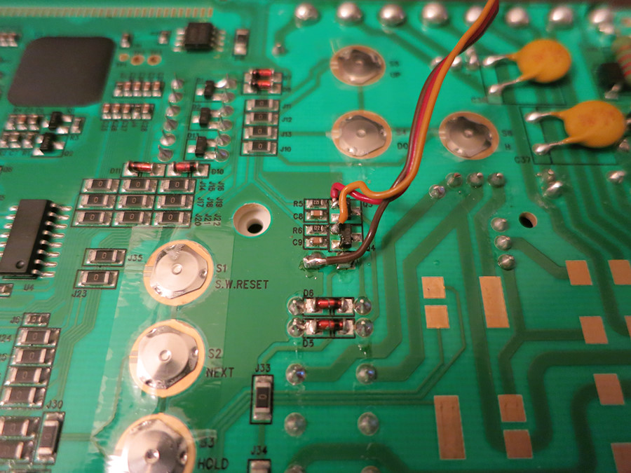 tapping in to the transistors that drive the set and reset lines on the latching relay