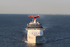 Carnival Pride northbound in the Chesapeake Bay underneath the Bay Bridge