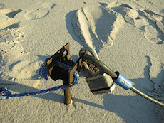 objective hazards on the beach - sharp rusty stake