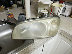 2000 Maxima headlight after cleaning but before refinishing