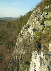 locals enjoying the evening on Pillar #2; climber 