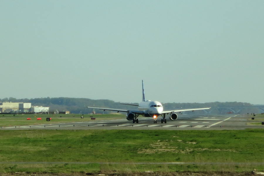 an aircraft taxis back to the end of rwy 19 after entering on taxiway S to pass another aircraft in line