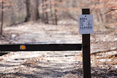 AREA BEYOND THIS SIGN CLOSED