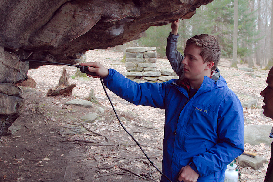 removing accumulations of unsightly climber chalk with water and brushes