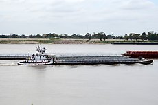 the Cajun Hustler (60' tug) pushed a barge upstream