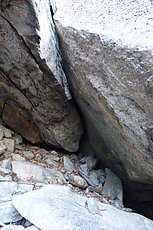 hard looking offwidth roof to vertical transition underneath this cave