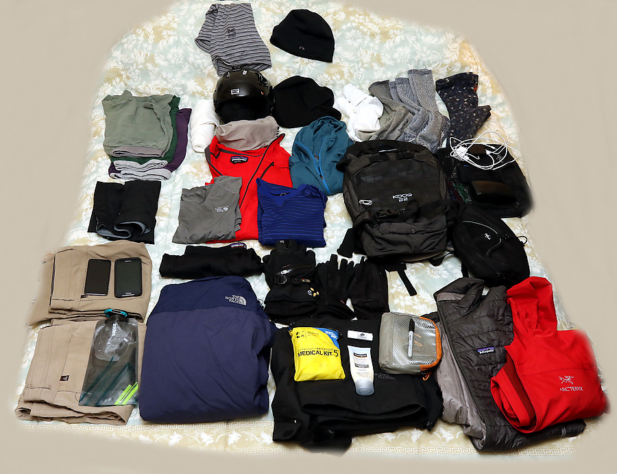 post-trip gear shakedown. All fit carry-on; nice travel shirt, hiking boots, and roller bag not shown.