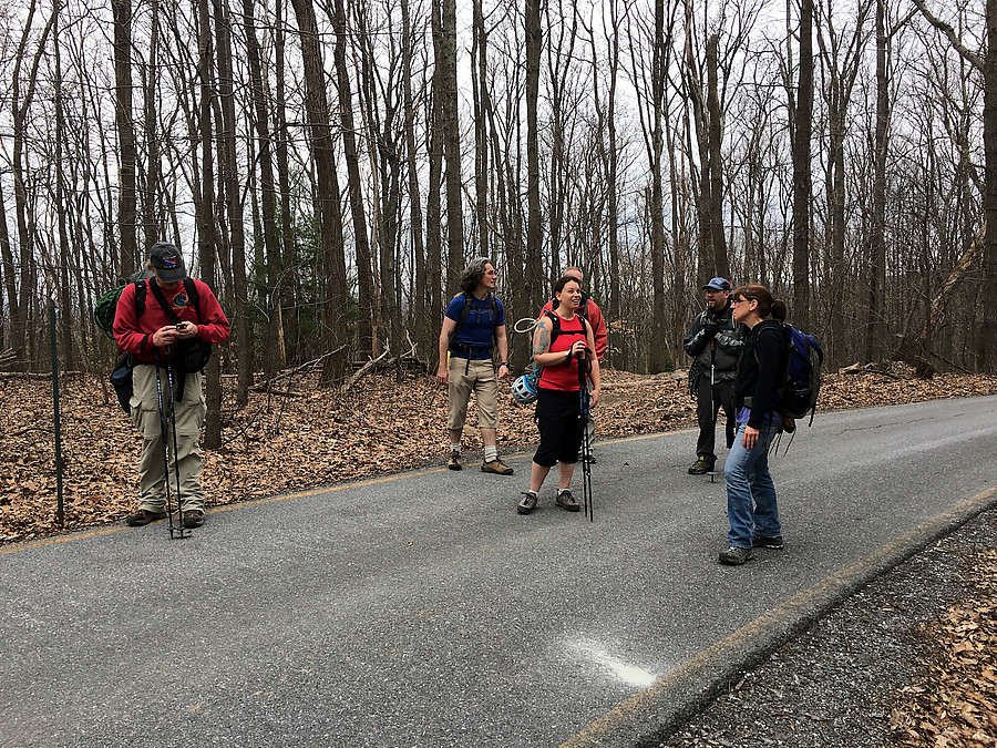 checking the GPS at the road crossing