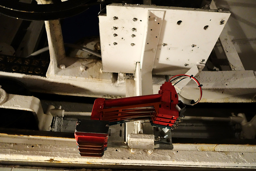 part of the alignment mechanism for the powered door