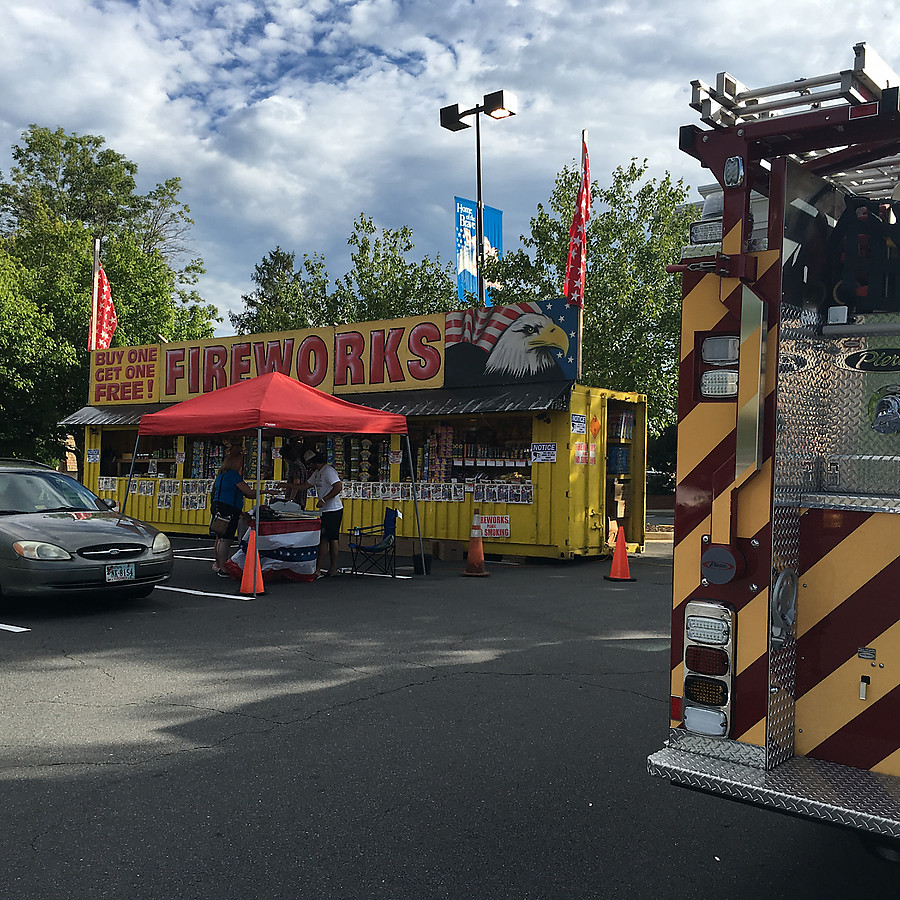 fireworks stand with fire truck