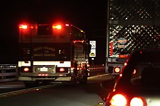 ambulance responding to wreck across bridge