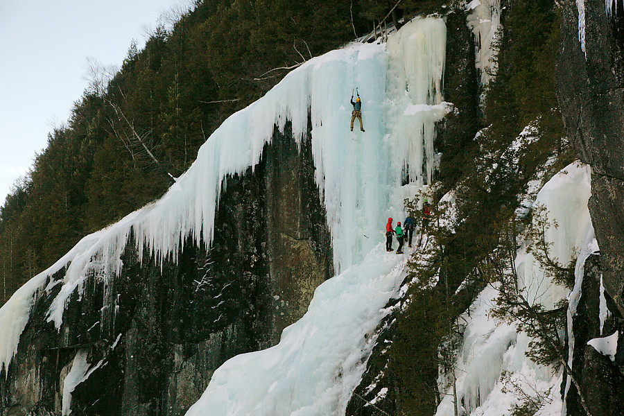 local climber cruising up Power Play. No screws that we saw until the headwall.