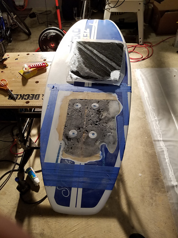 bias CF and heavy fiberglass. Modeling clay in all holes. I filled air bubble pockets from oversize pour with microballoos and epoxy.