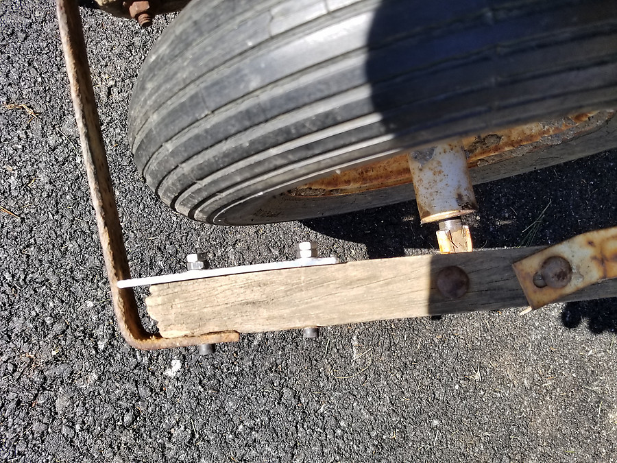 improvised repair on the wheelbarrow
