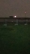 bad photo but the flare on the landfill is impressive!