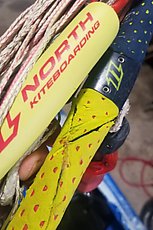 kiting is dangerous - the clean slits on the bar padding you can see were caused when the lines got wrapped after an inversion in fluky wind. It took a great deal of force to remove the lines from the bar.