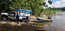 swift water rescue for kids who got stuck on rocks when the water rose