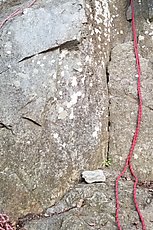 ropes of the offending climbers (thrown rock for scale)