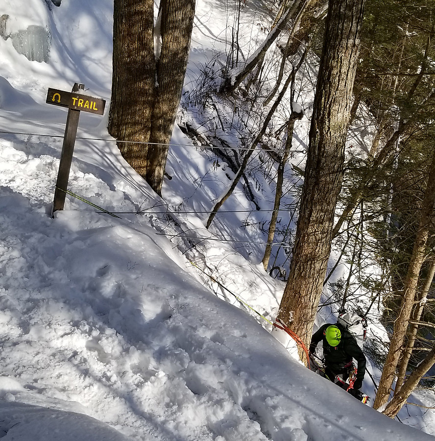 the rap line on the "Trail" sign looked sketchy but it turned out to be just protection against a slip while the guy was sketching down to set up a toprope