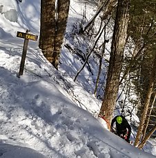 the rap line on the "Trail" sign looked sketchy but it turned out to be just protection against a slip while the guy was sketching down to set up a toprope