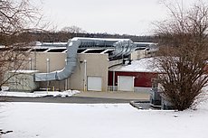 "Nabholz built this 65,000-square-foot state-of-the-art training facility with five firing ranges, including one rifle range and four pistol ranges. Features include fully integrated control centers; administrative offices and classrooms; fully integrated target systems; range ventilation systems unlike any other currently in existence; extensive sound attenuation system; 3’ overlap saw-tooth roof system, which provides all-weather protection; unique girder system; extensive ballistic steel protection; and an emergency generator and related switch-gear."