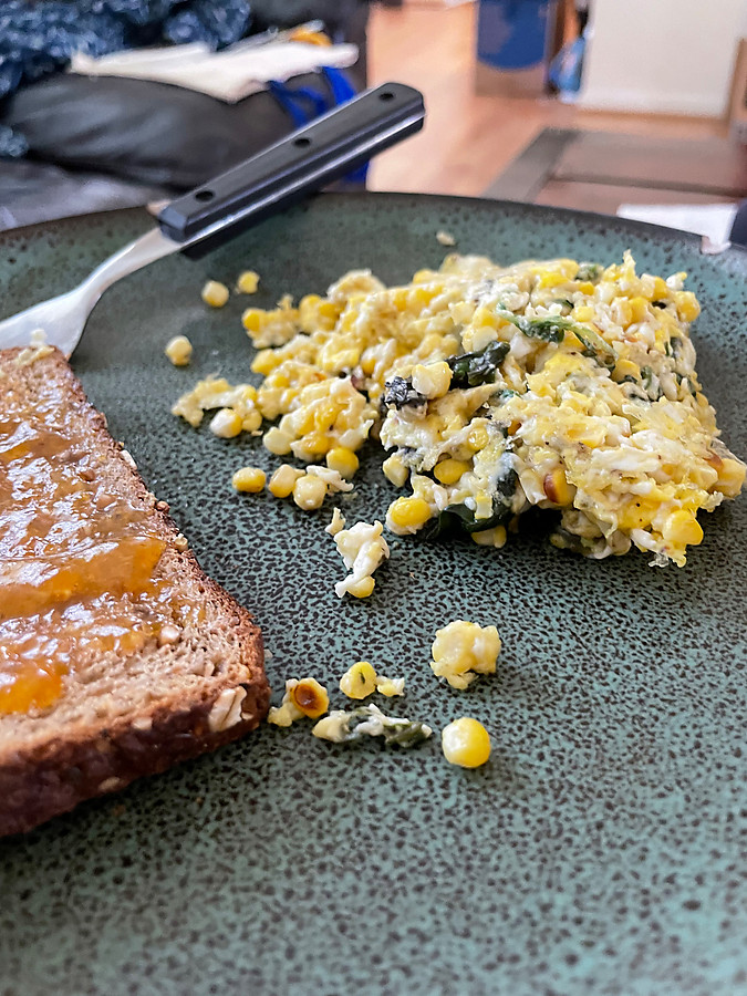 corn on the cobb, spinach, and eggs