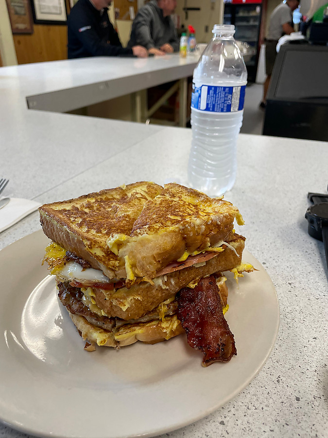 french toast, bacon, sausage, ham, eggs, and cheese, and well made